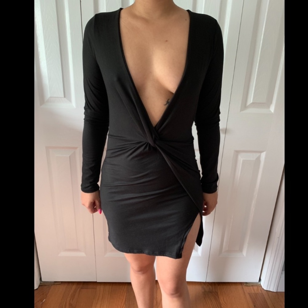 Long sleeve black dress with slit